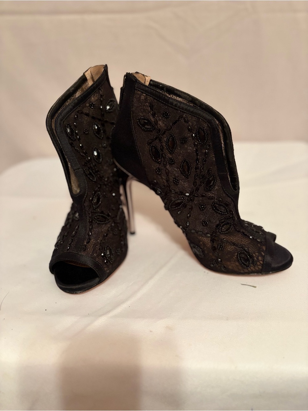 BCBGMaxAzria black lace and mesh peep-toe booties